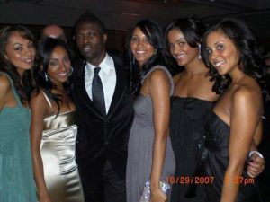 Girl group Epiphany and Jermaine Browne at Angel Ball posing for a picture after their performance.